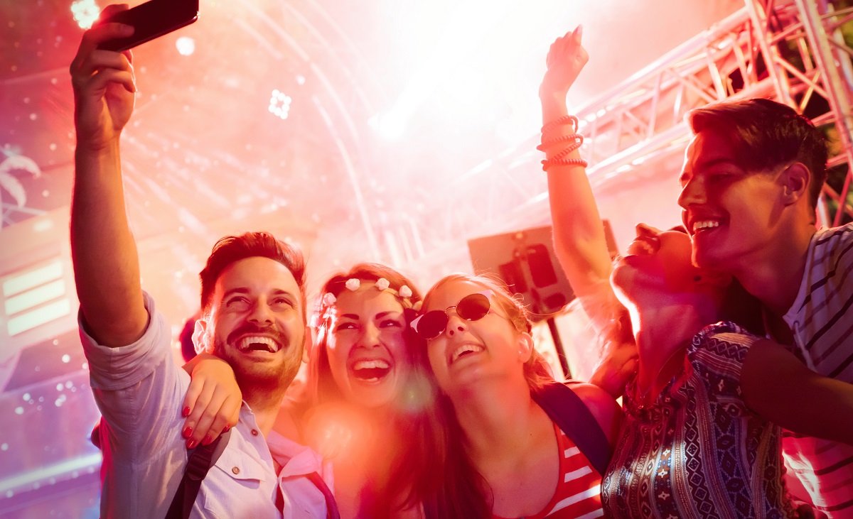 Friends having fun at the festival