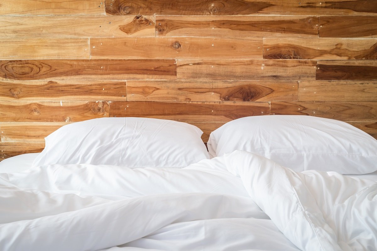 bed with white sheets