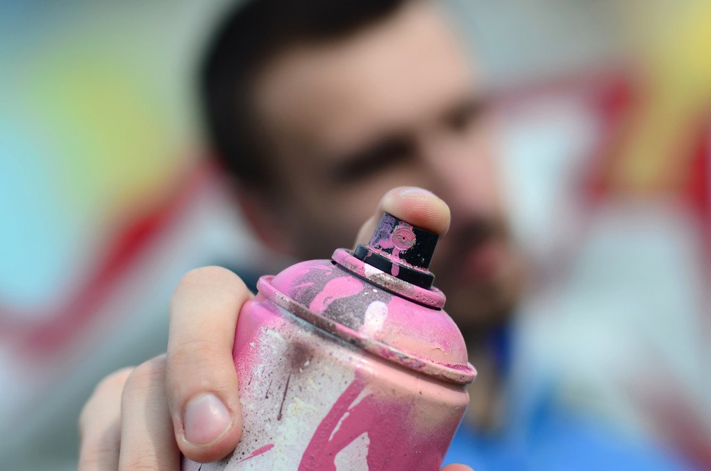 artist with spray paint