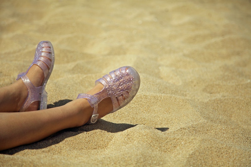 kid with jelly shoes