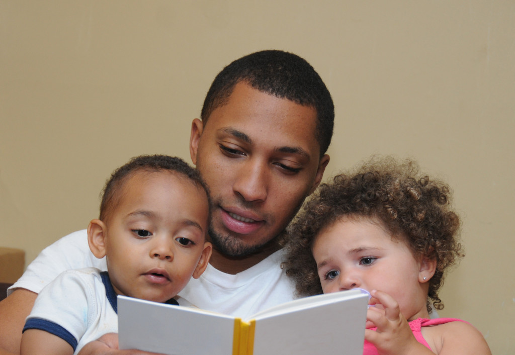 Reading Two Generation Family Father Son with dirty face and Niece Blue Eyes