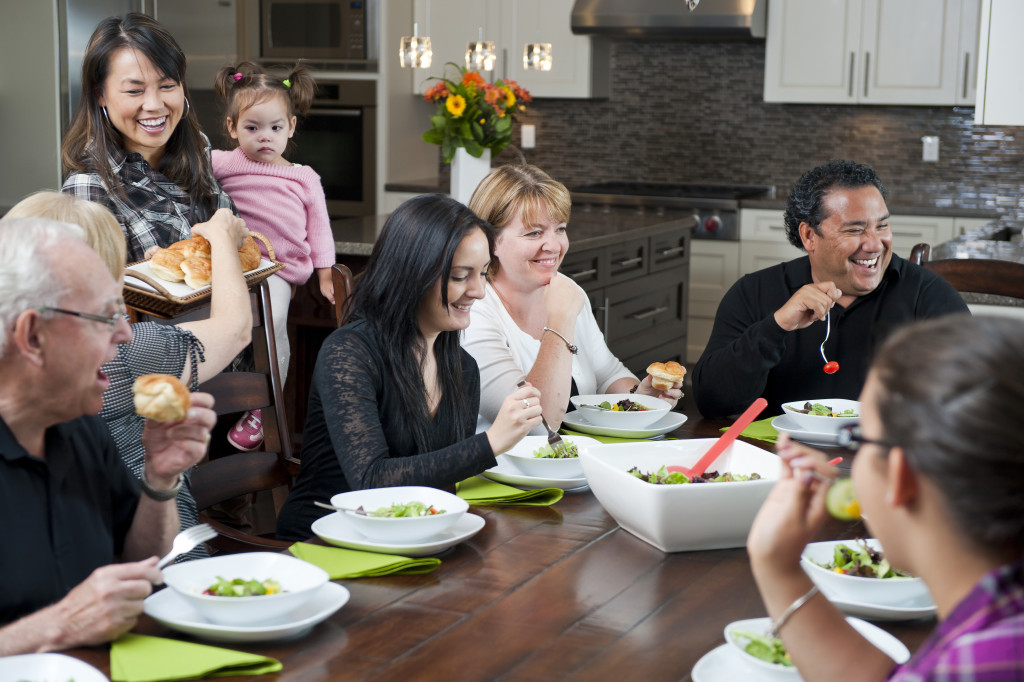 a family dinner / the family interaction / that is happening