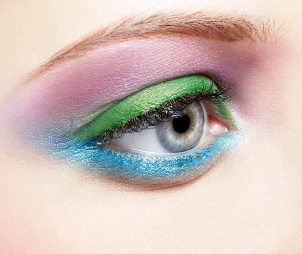 Body part portrait of beautiful young woman eye shadow make up