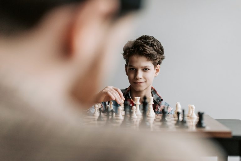 boy playing chess