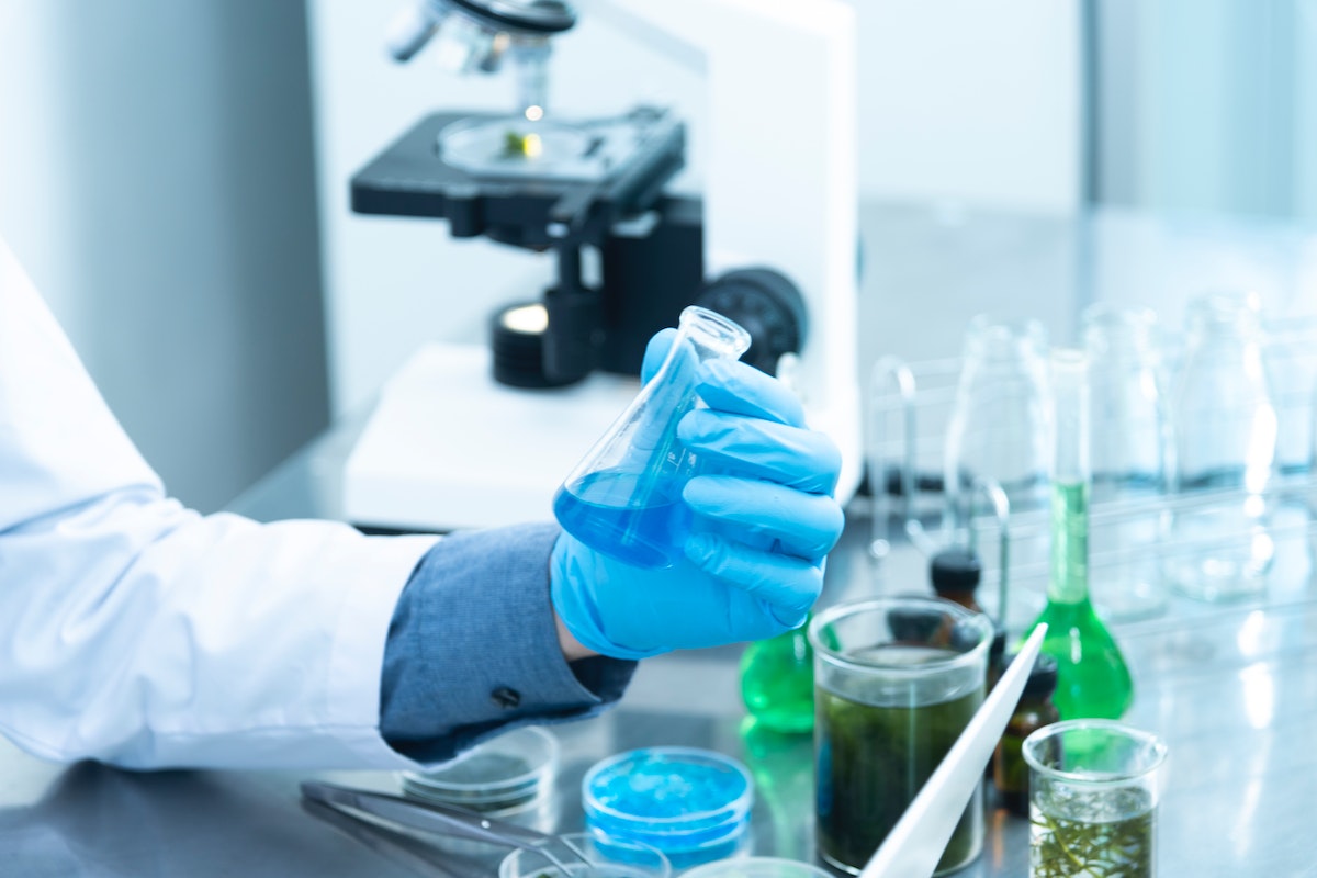 person working inside a health laboratory