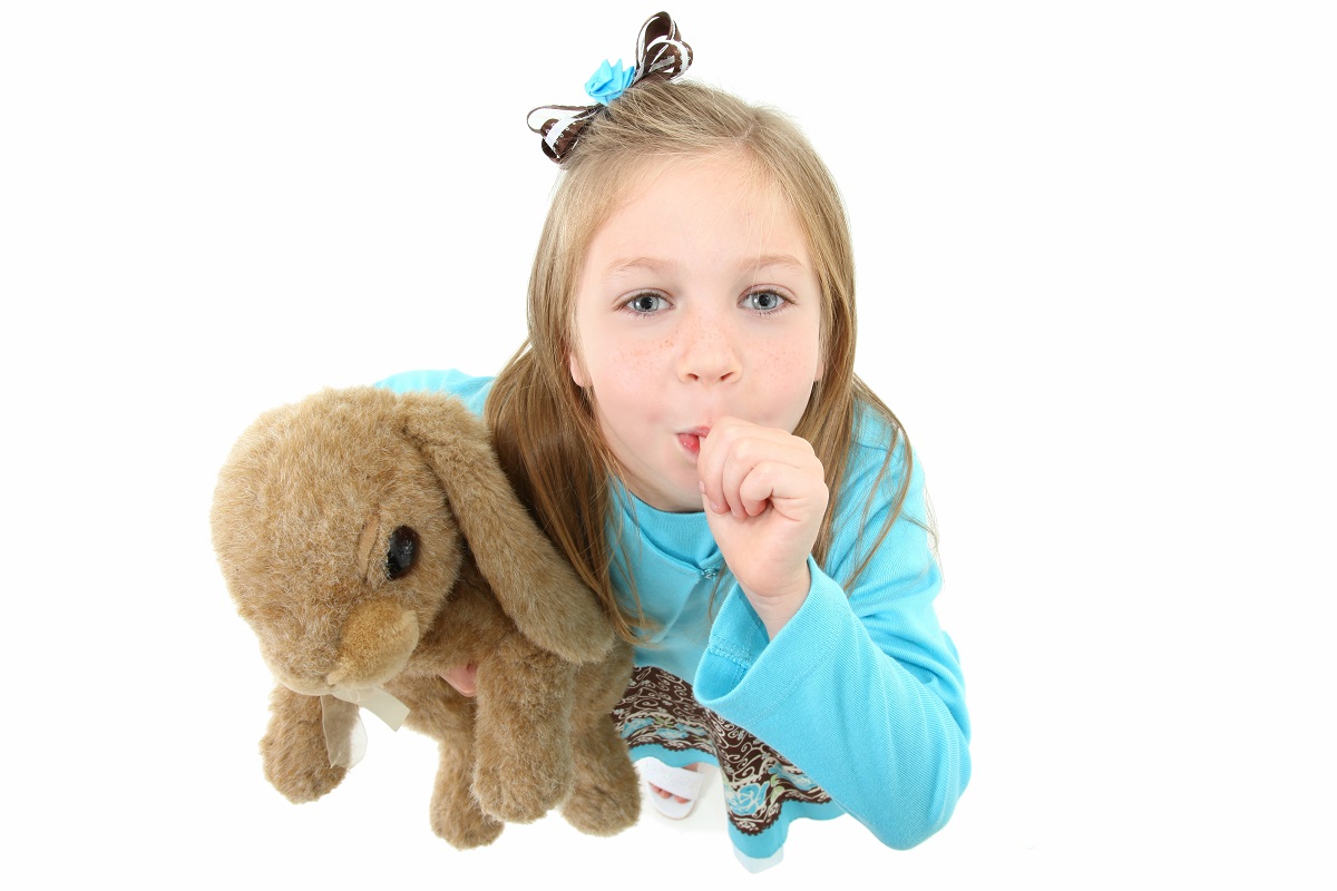 kid sucking her thumb