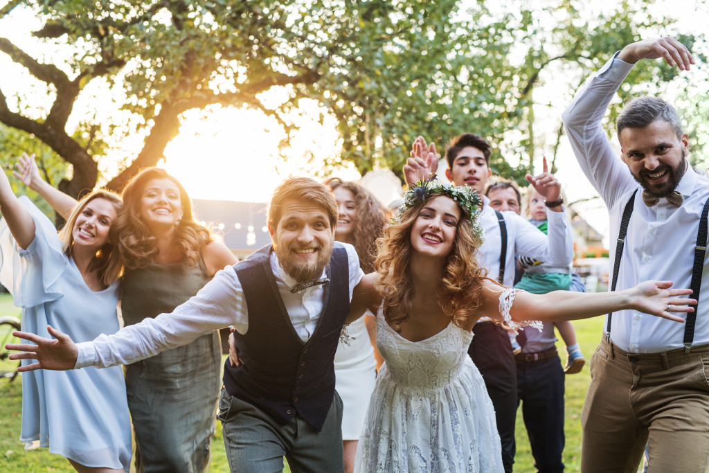 newly weds with their guests